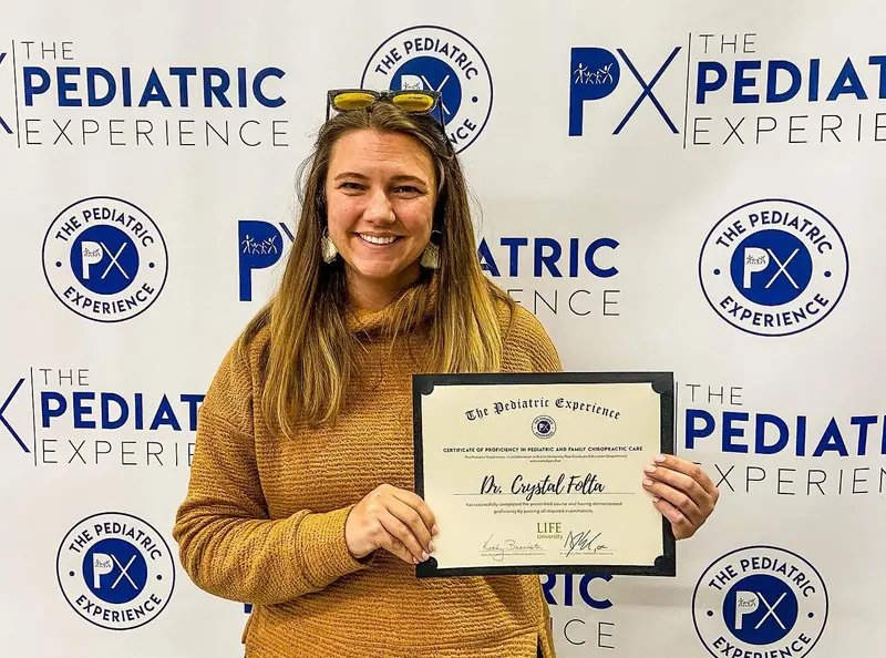 Dr. Crystal Folta with her PX certificate